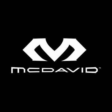 McDavid logo on a black background representing sports protection and stability.